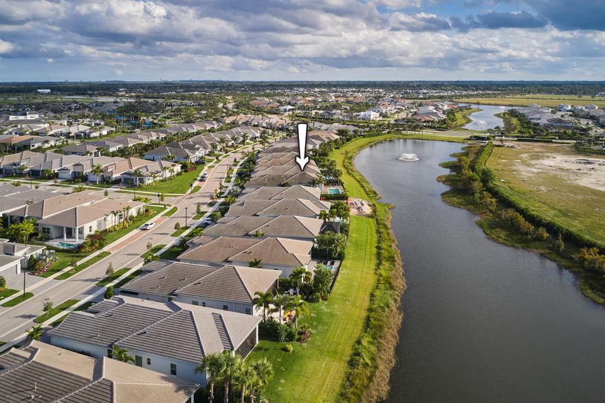 Spectacular lake view home in Avenir's top 55 active adult community called Regency.This is one of the best locations in the community. The home still feels new, light and bright and all the main rooms in the house overlook the pool and lake. Enjoy some of the best sunset views that you could ever imagine. Full house generator and impact glass and doors. 12 Foot ceilings in the main living areas, and designer pool upgrades.