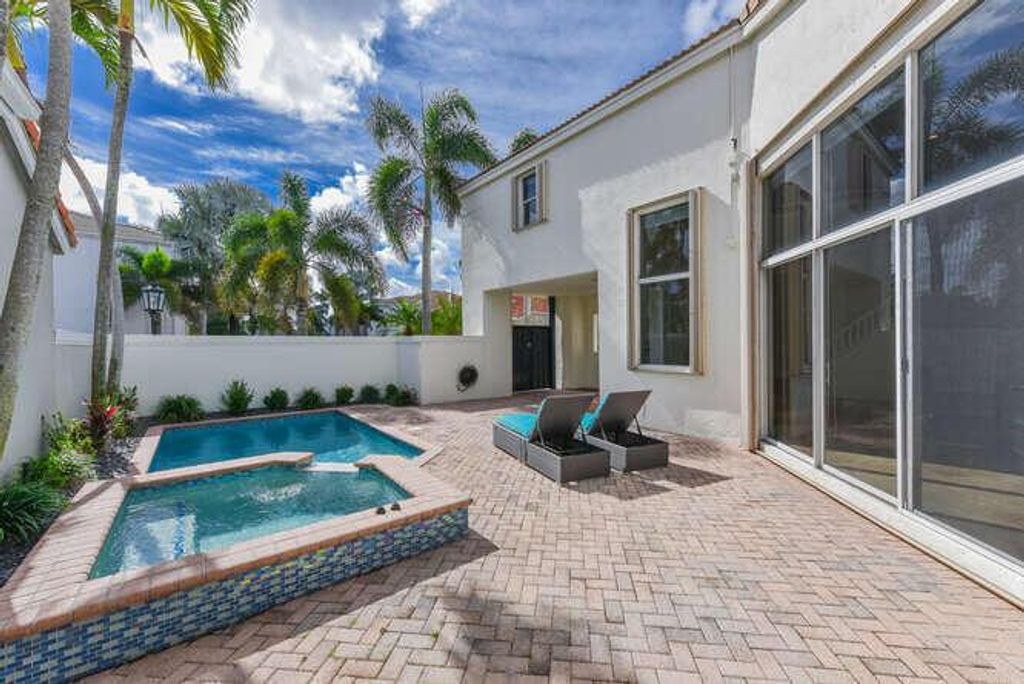 Photo of 4303 NW 61st Lane, Boca Raton, FL 33496 (MLS # R11120034)