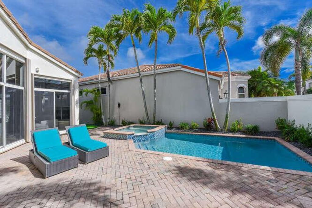 Photo of 4303 NW 61st Lane, Boca Raton, FL 33496 (MLS # R11120034)