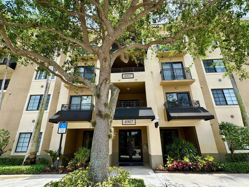 Photo of 4907 Midtown Lane #1215, Palm Beach Gardens, FL 33418 (MLS # R11138829)