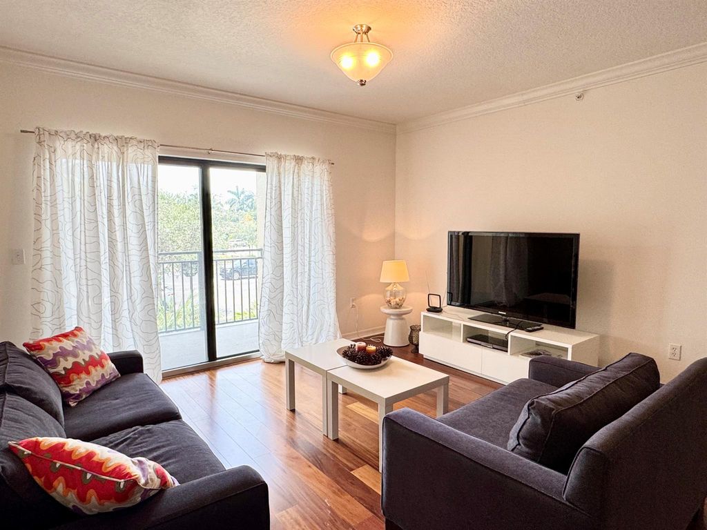 Photo of 4907 Midtown Lane #1215, Palm Beach Gardens, FL 33418 (MLS # R11138829)