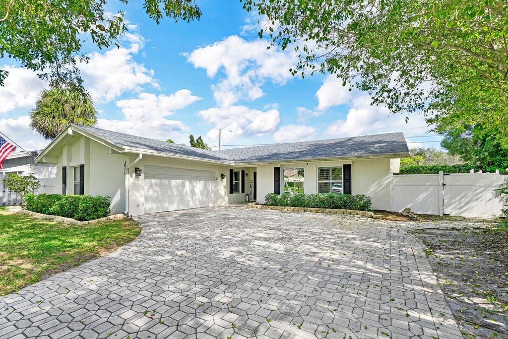 Photo of 3048 NW 25th Way, Boca Raton, FL 33434 (MLS # B26038480)
