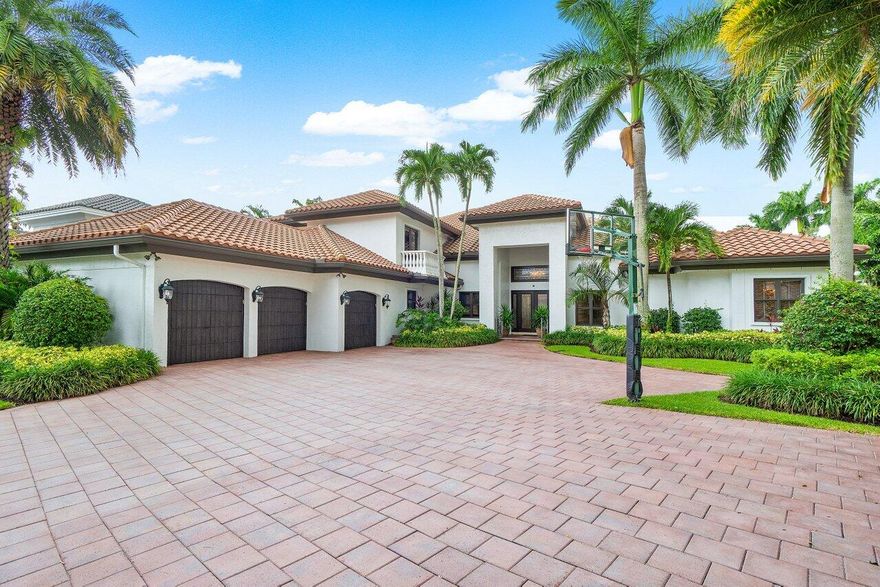 Welcome to this remarkable residence in the highly sought after Windsor Bay subdivision of Woodfield Country Club. This exceptional home boasts 5 bedrooms, 6.1 bathrooms, a custom office and an expansive flex space, which makes for a perfect combination of luxury, comfort and versatility. The downstairs area features four spacious bedrooms, including the primary bedroom, each with en-suite bathrooms for ultimate convenience and privacy. A spacious office is also located on the main level. Upstairs you will find a generously-sized bedroom and bathroom, adjacent to a large flex space, offering endless possibilities as a game room, media center, gym and more. The heart of this home is the gourmet kitchen, featuring top-of-the-line appliances, custom cabinetry, and a generous walk-in pantry. For the wine enthusiasts, a temperature controlled wine cellar awaits. Nestled on an oversized lot, the backyard is a private oasis complete with an expansive salt chlorinated and heated pool with spa, and a dedicated cabana bathroom.  The incredible summer kitchen is perfect for outdoor entertaining, while the ample grass area offers plenty of space for play and relaxation.  Additional features include a 3-car garage, full house generator and hurricane impact windows and doors.  
Woodfield Country Club offers an array of world-class amenities, including a Kipp Schulties designed golf course, 20 tennis courts, pickleball courts, a state-of-the-art fitness center, a full service spa and salon, five restaurants, and more, ensuring a lifestyle of luxury and leisure.
