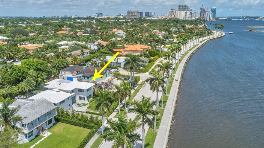 Just Completed on South Flagler Drive in the very sought-after Historic West Palm Beach. This mid-century home was completely renovated and expanded by Ritzzo Development and designed by Mizner award-winning FGS Design. While historic, the cedar paneled home is brand new featuring 3,908 square feet, 4 bedrooms, and 5.1 baths. While retaining its '60s glamour, the house features all of today's modern conveniences and design preferences by HW interiors, including real terrazzo tile and engineered hardwood floors throughout, an open kitchen with Thermador appliances, full Crestron home system lighting and music, and smart home technology. Corner windows in the living room and primary bedroom suite with marble master bathroom showcase waterfront views. Enjoy the resort-style outdoor space with lush landscaping by Environment Design Group, a built-in BBQ, custom stone pavers, a cabana bathroom, and a beautiful custom pool.