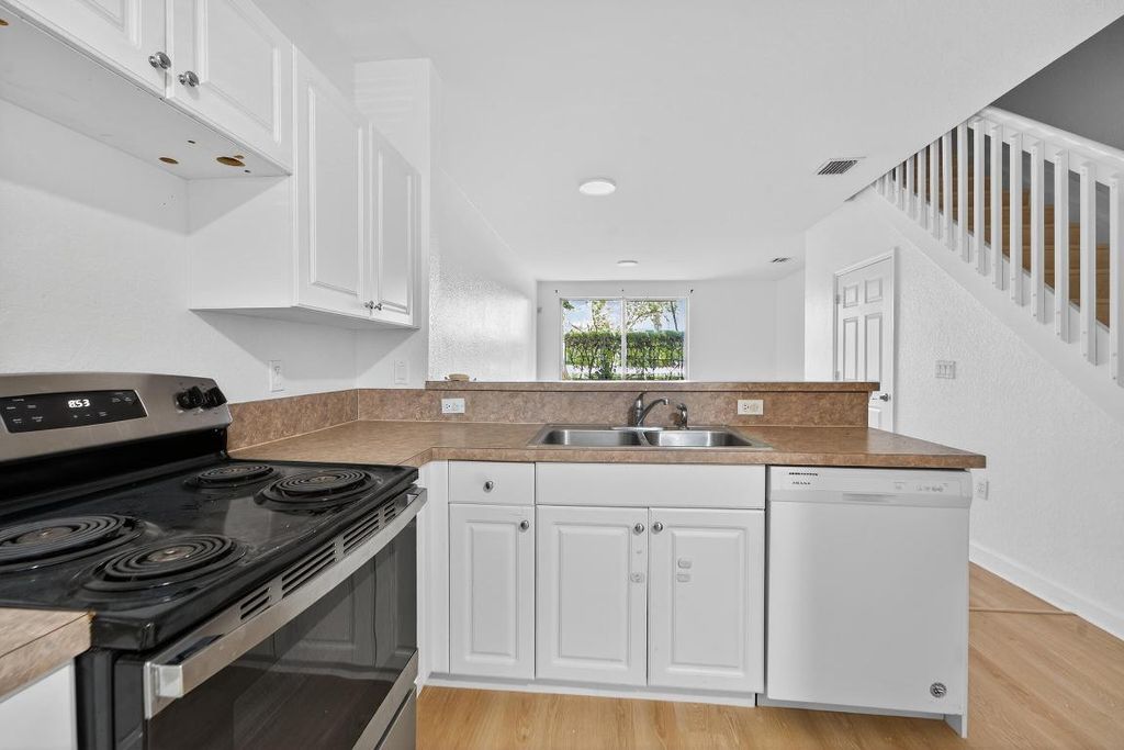 Photo of 4182 Napoli Lake Drive, Riviera Beach, FL 33410 (MLS # R11117386)