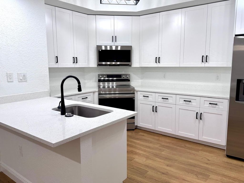Photo of 2801 Riverside Drive #103 S, Coral Springs, FL 33065 (MLS # F10492006)