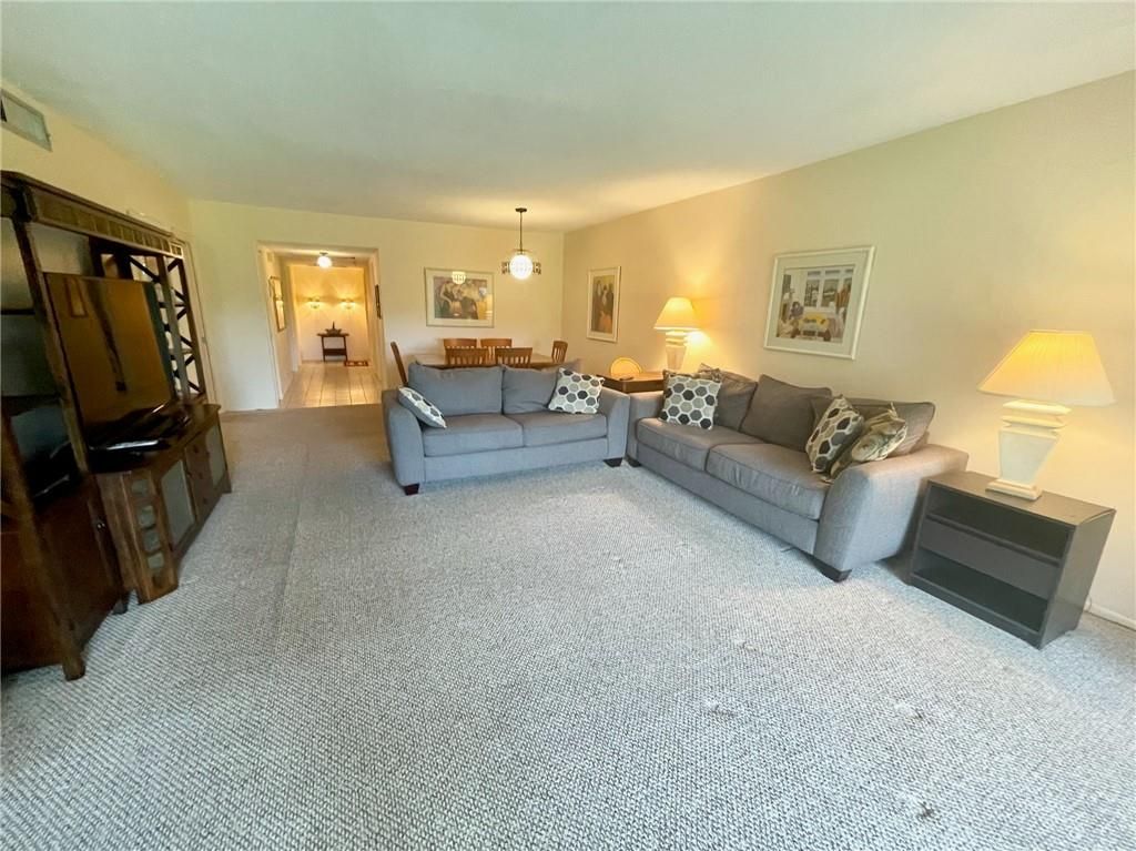 Photo of 3300 N Palm Aire Dr #101, Pompano Beach, FL 33069 (MLS # F10296673)