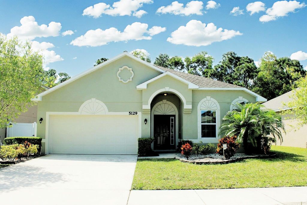 Photo of 5129 NW Wisk Fern Circle, Port Saint Lucie, FL 34986 (MLS # R11077058)