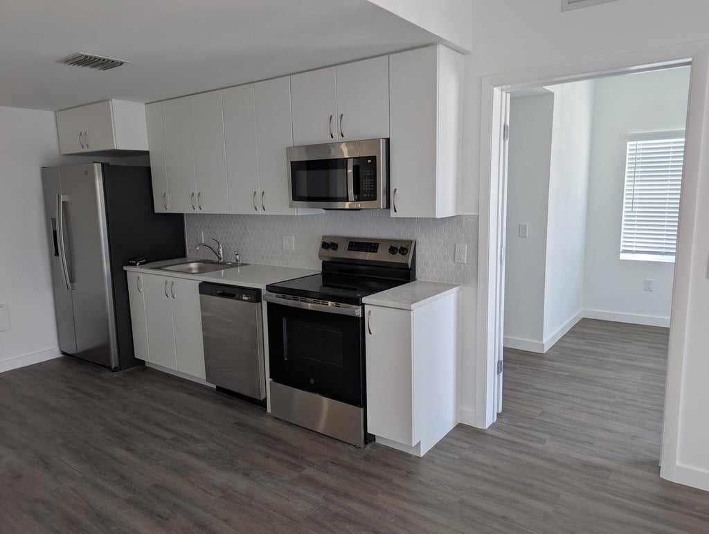 Photo of 2202 N Tamarind Avenue #202, West Palm Beach, FL 33407 (MLS # B26053639)