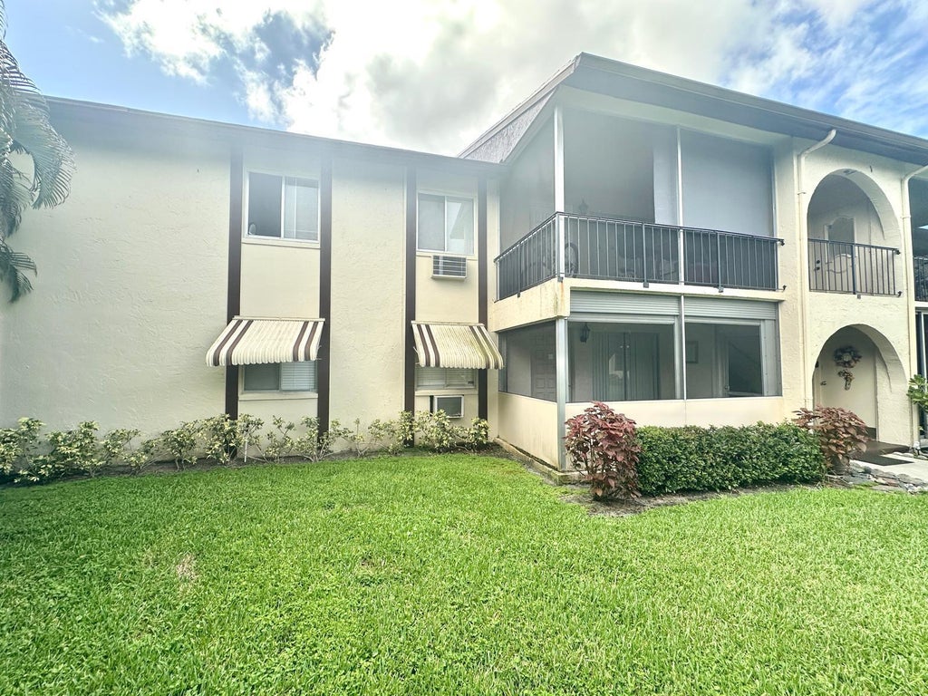 Photo of 5773 La Pinata Boulevard #C-1, Greenacres, FL 33463 (MLS # B26061985)