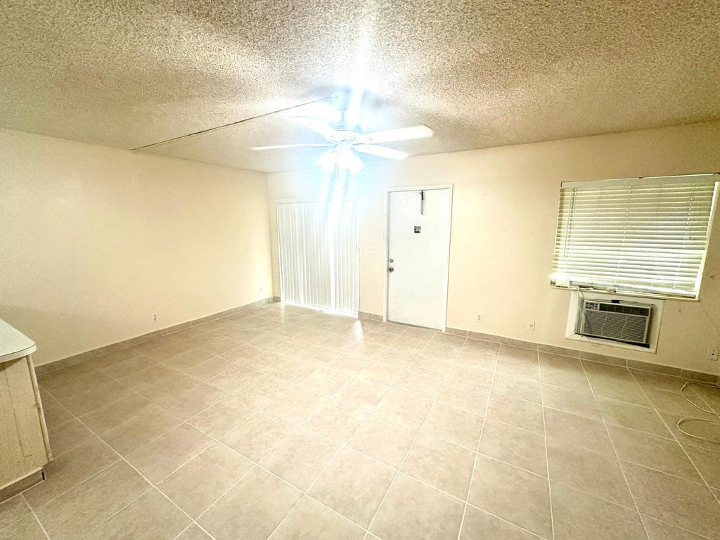 Photo of 5773 La Pinata Boulevard #C-1, Greenacres, FL 33463 (MLS # B26061985)
