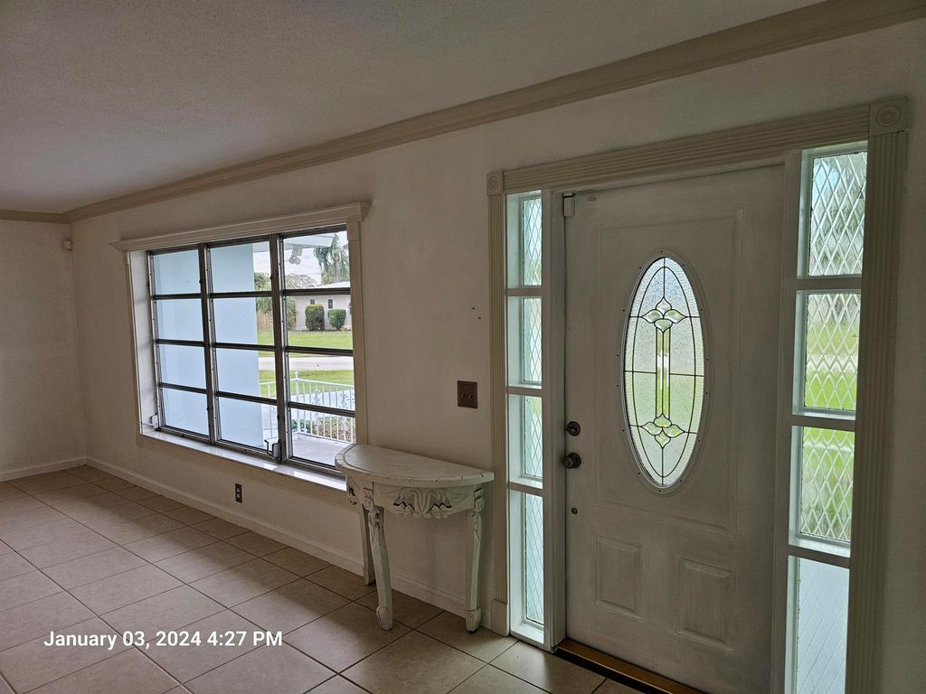 Photo of 308 SE Verada Avenue, Port Saint Lucie, FL 34983 (MLS # R10947110)