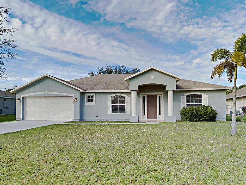 Photo of 1225 SW Asturia Avenue, Port St Lucie, FL 34953 (MLS # R11082719)