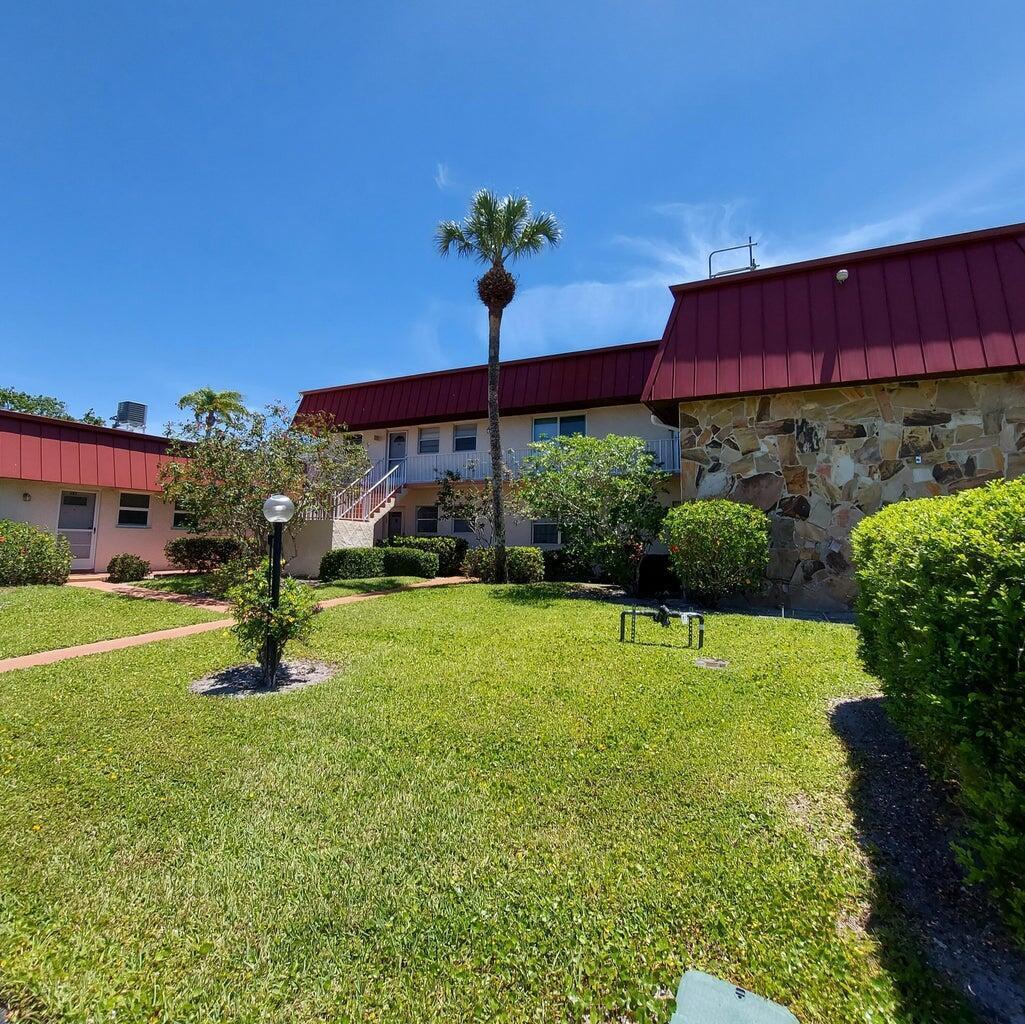 Charming 2nd-floor condo in the desirable Greenway Village 55+ community in Royal Palm Beach. Ideally located across from Commons Park with walking trails, driving range & local events. Walking distance to shopping, dining, bus routes & rec center. Only 5 min to hospital, 15 min to downtown West Palm Beach & beaches, 1.5 hrs to Miami & 2.5 hrs to Orlando. Community amenities include 4 pools, clubhouse, library, gym, sauna & more. Features a spacious master with walk-in closet, updated bath, new roof, mansard, electrical panel, flooring, kitchen, new AC & enclosed porch. Move-in ready!