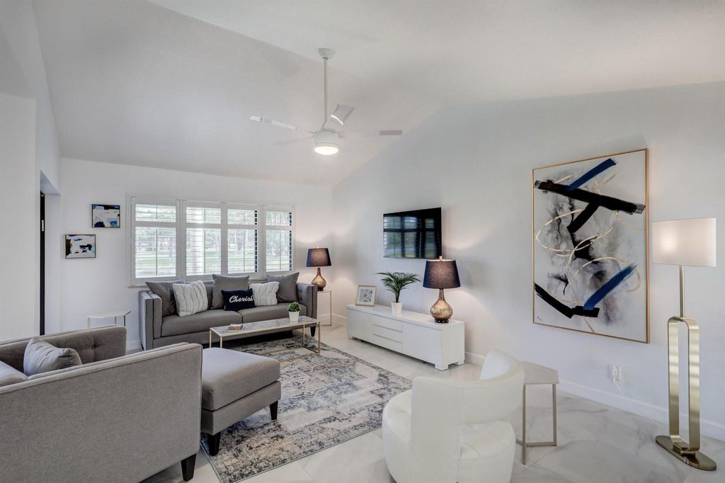 Photo of 6 Lexington Lane #D, Palm Beach Gardens, FL 33418 (MLS # R11127775)