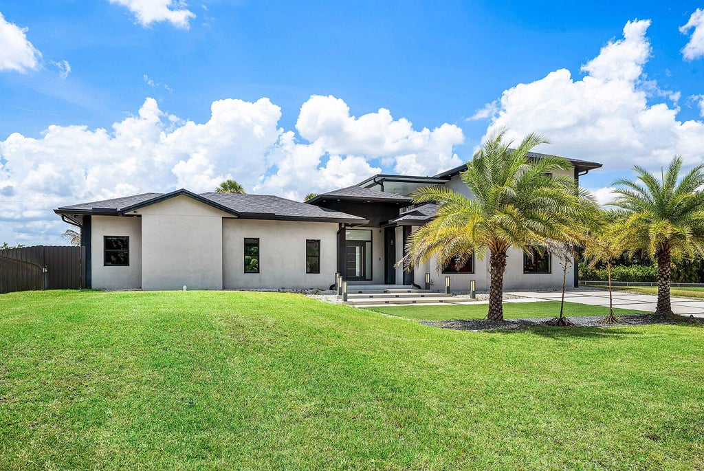 Photo of 641 Marshall Road, West Palm Beach, FL 33413 (MLS # B26077692)
