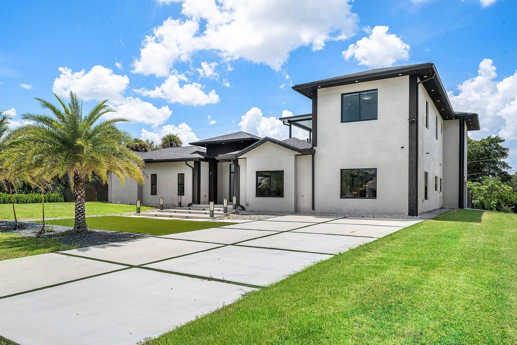 Photo of 641 Marshall Road, West Palm Beach, FL 33413 (MLS # B26077692)