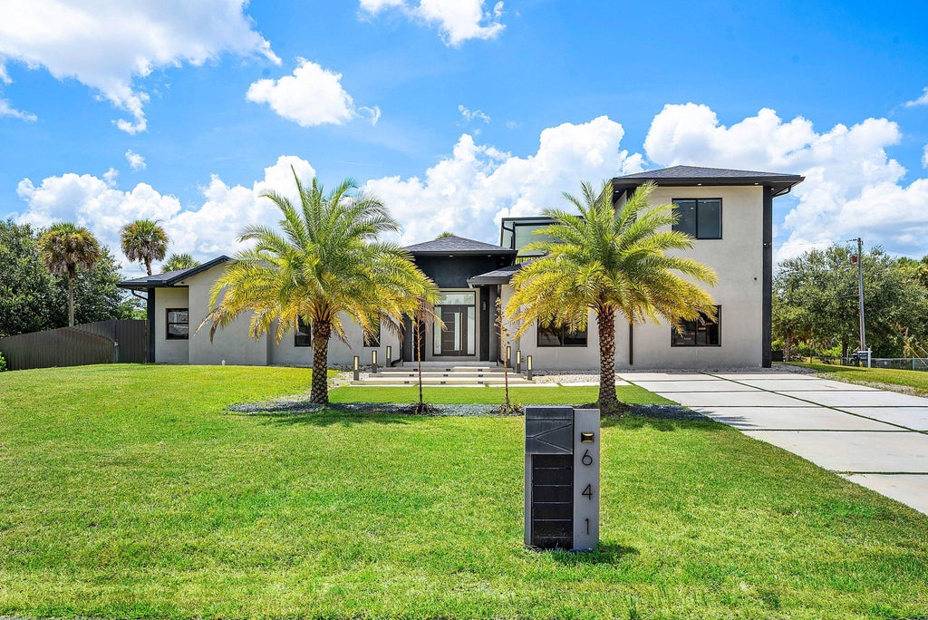 Photo of 641 Marshall Road, West Palm Beach, FL 33413 (MLS # B26077692)