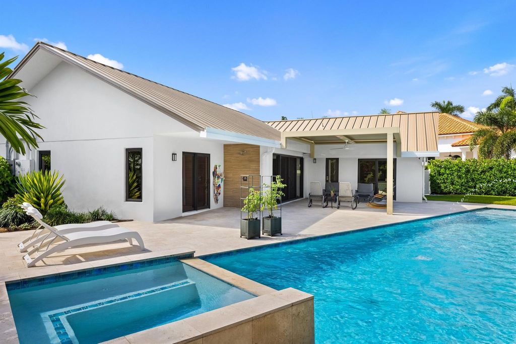 Photo of 843 NE Mulberry Drive, Boca Raton, FL 33487 (MLS # R11130777)