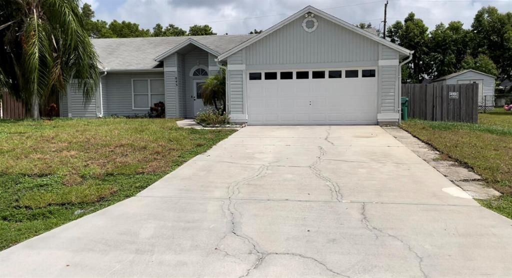 Photo of 843 SW Thrift Avenue, Port Saint Lucie, FL 34953 (MLS # R10821552)