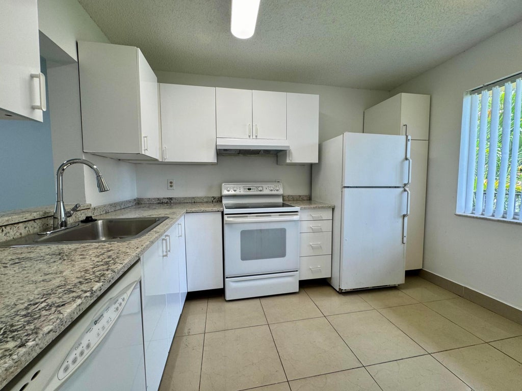 Photo of 7770 NW 50TH Street #209, Lauderhill, FL 33351 (MLS # B26058927)