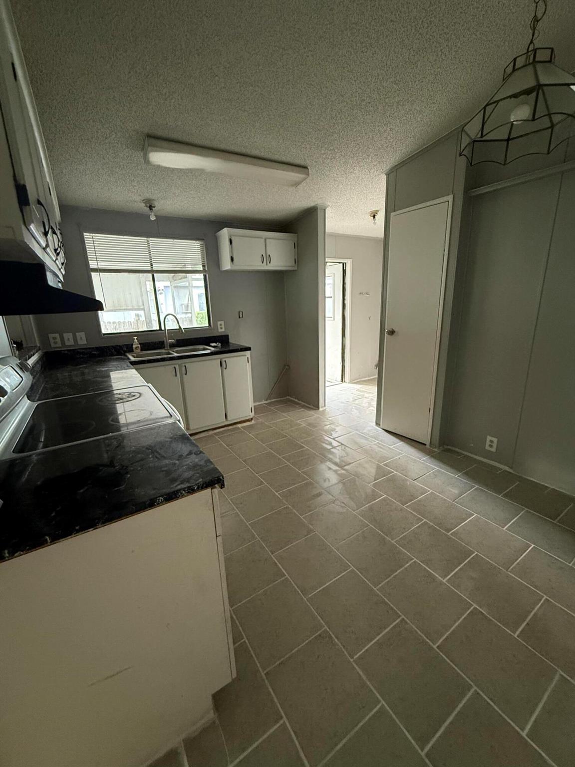 A Two Bedroom two bathroom lakeside Okeechobee home for rent. You will find privacy and security here since the backyard is fully fenced. There is extra storage available for you to conveniently store your belongings or pursue any hobbies you may have! Step inside and discover the delightful features this home has to offer! The bedrooms are very spacious and ample, the floor plan optimizes all the space making it ideal for your family to live comfortably. Schedule a viewing today and imagine the possibilities that await you in this comfortable and inviting property.