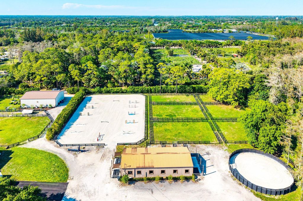 Photo of 6149 Park Lane E #(barns + Studios), Lake Worth, FL 33449 (MLS # B26007029)