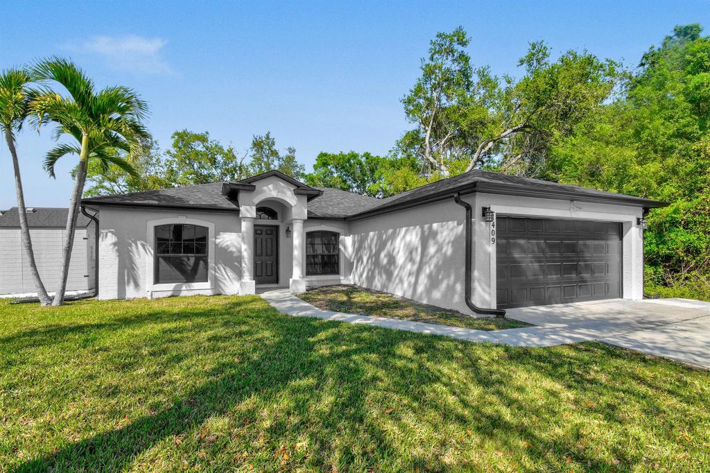 Photo of 1409 SW Gastador Avenue, Port Saint Lucie, FL 34953 (MLS # R11070012)