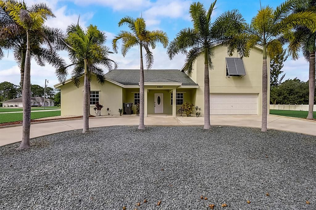 Photo of 9425 Hall Boulevard, West Palm Beach, FL 33412 (MLS # R10755928)
