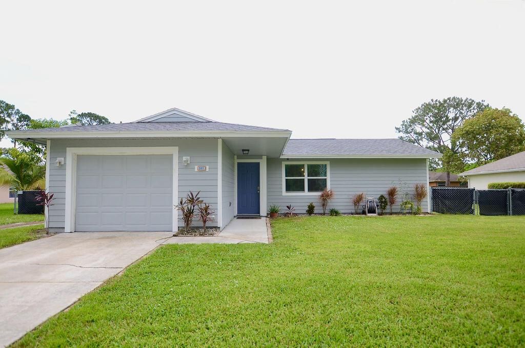 Photo of 3811 SW Janiga Street, Port St Lucie, FL 34953 (MLS # R10904331)