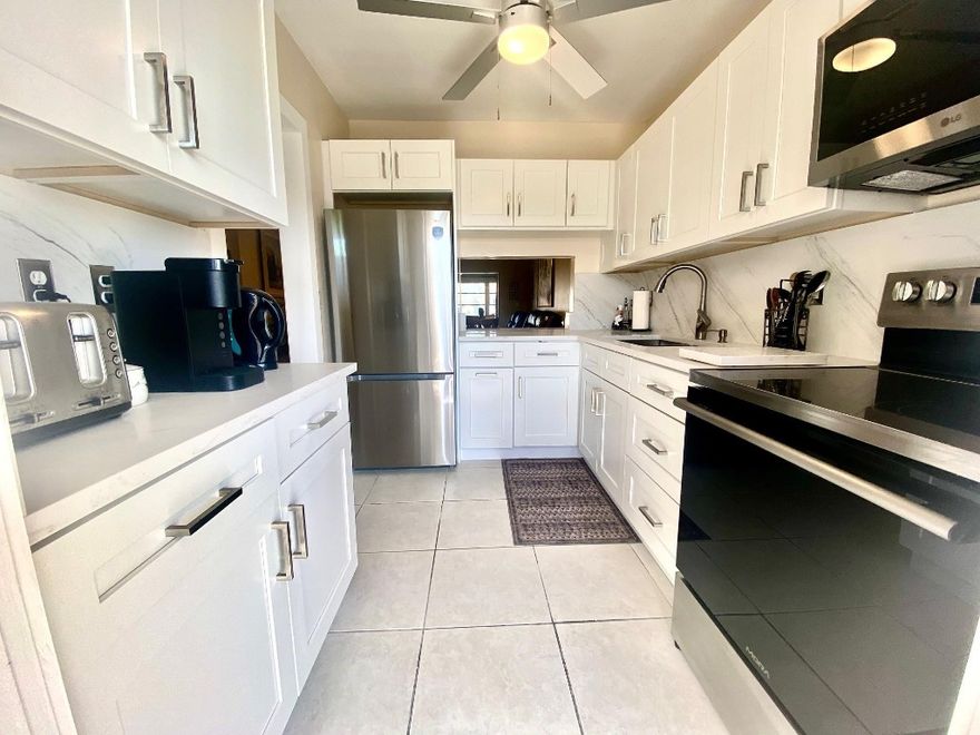 The Best unit, in the Best Building, top Floor and an Extra Nice New Kitchen! Just a few steps to one of the nicest pools in East Boca. If you don’t know about the Boca Verde East community, “Then Get Ready to Smile”, the most affordable 2 bedroom 2 Bath condo in EAST Boca Raton and reasonable condo fees.  This community is nestled on NE 20th street. You are probably familar with the exotic Banyan trees that enchant the winding road and continue into this plush & impeccable grounds of the community.  Discover the Best Value & 5-Star location in the city. This condo whispers Romance from the second you enter the foyer, but you’re gong to have to come look to see how nice it is… Great Tranquility at this quiet 55 plus community.