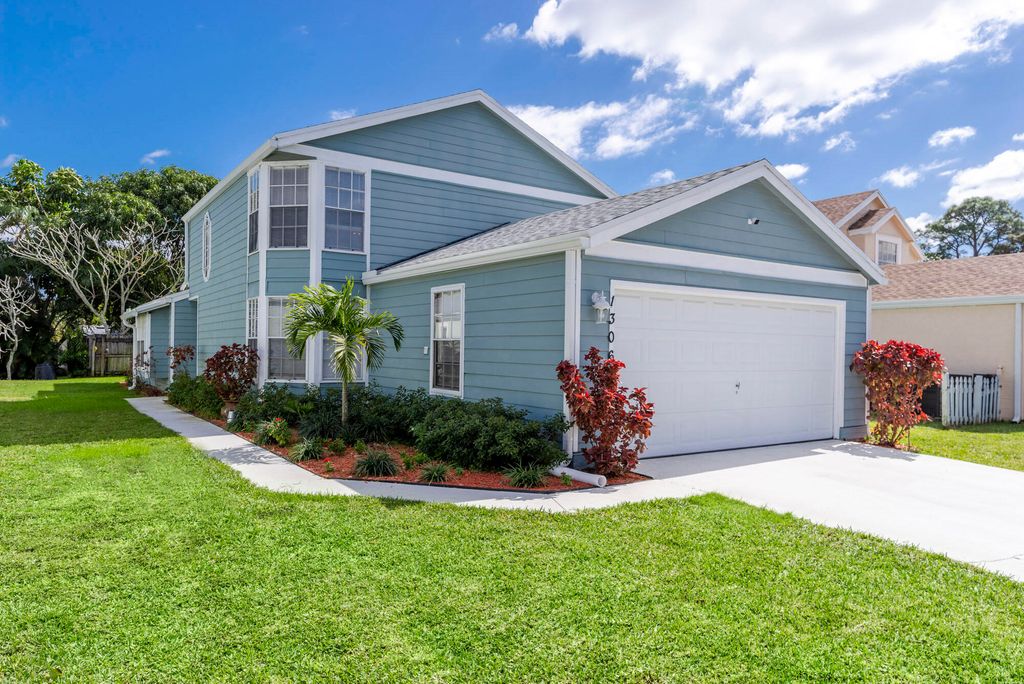 Photo of 1306 Wild Daisy Lane, West Palm Beach, FL 33415 (MLS # B26025074)