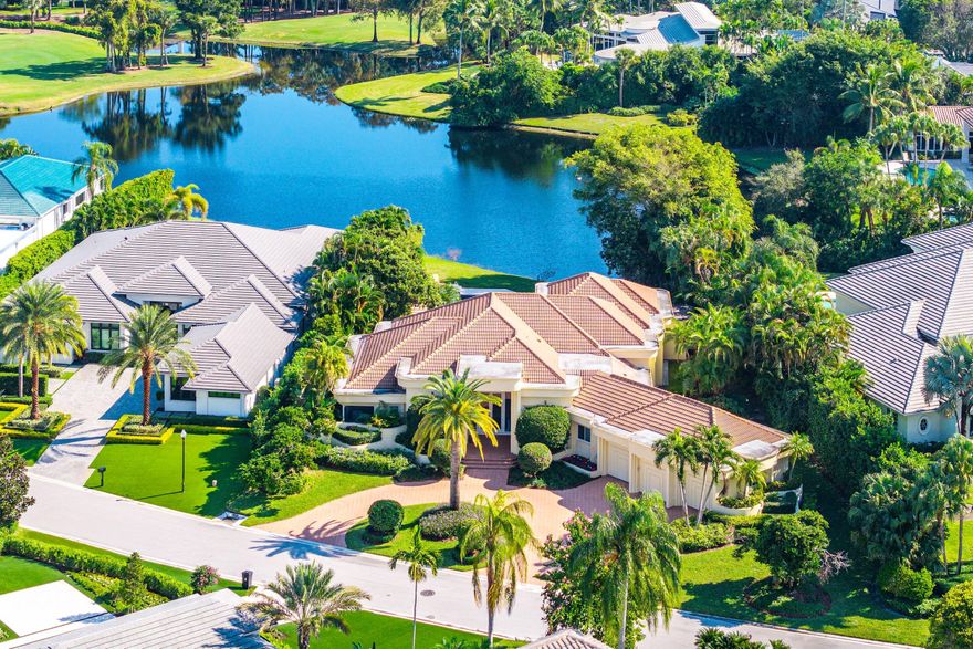Exquisite single-story residence in the  prestigious community of Frenchman's Creek offering 3 bedrooms plus an office, 5.5 bathroom and over 4200 sf of living space. Set on half an acre of private land, this home enjoys sweeping lake views that serve as a serene backdrop from nearly every room.

Be impressed by the thoughtful, open concept floor plan, each space is designed to maximize the breathtaking vistas. A wall of expansive windows along the rear reveals natural light and creates an airy ambiance, ideal for everyday living and effortless entertaining.

The spacious primary suite features two custom walk-in closets and dual primary bathrooms. Embrace Florida's Indoor/outdoor lifestyle as you step through as you step through a full wall of sliders onto the large covered patio and additional screened area, complete with a summer kitchen. The modern pool and spa overlook the sparkling lake, accompanied by a separate cabana bathroom for added convenience. There is also ample green space to enjoy the outdoors. 

Some other exciting features with this home include a 3 car garage, full impact glass, a newer roof and newer AC units - providing comfort and peace of mind. Don't miss this exceptional opportunity. Schedule your private showing today!

Frenchman's Creek Members enjoy the ultimate concierge lifestyle with resort amenities, state-of-the-art brand new clubhouse, two 18-hole championship golf courses - for only 600 homes. Numerous dining options, navigable waterways, racquet sports, social events and so much more. The exclusive Beach Club, included with membership, located on beautiful Juno Beach allows use of pool, restaurant, beach attendant and water activities.