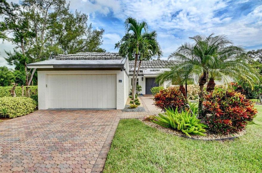 Outstanding Villa on a Cul-de-sac with the most charming features and view. Updated kitchen with newer kitchen appliances and granite counter tops and rare French doors to side patio.Walk out to the patio to enjoy the BRIGHT AND AIRY surroundings. Beautifully updates bathrooms.Very Tropical setting. This beautiful villa has magnificent flooring. New roof being installed. New A/C. This villa is bright and airy is a MUST SEE 1 of a kind. Bring your fussiest buyers. Hunters Run has 3 golf courses, 20 Tennis courses, 4 Pickle Ball Courts and 7 restaurants with top rated fitness center. Country Club living at its best.