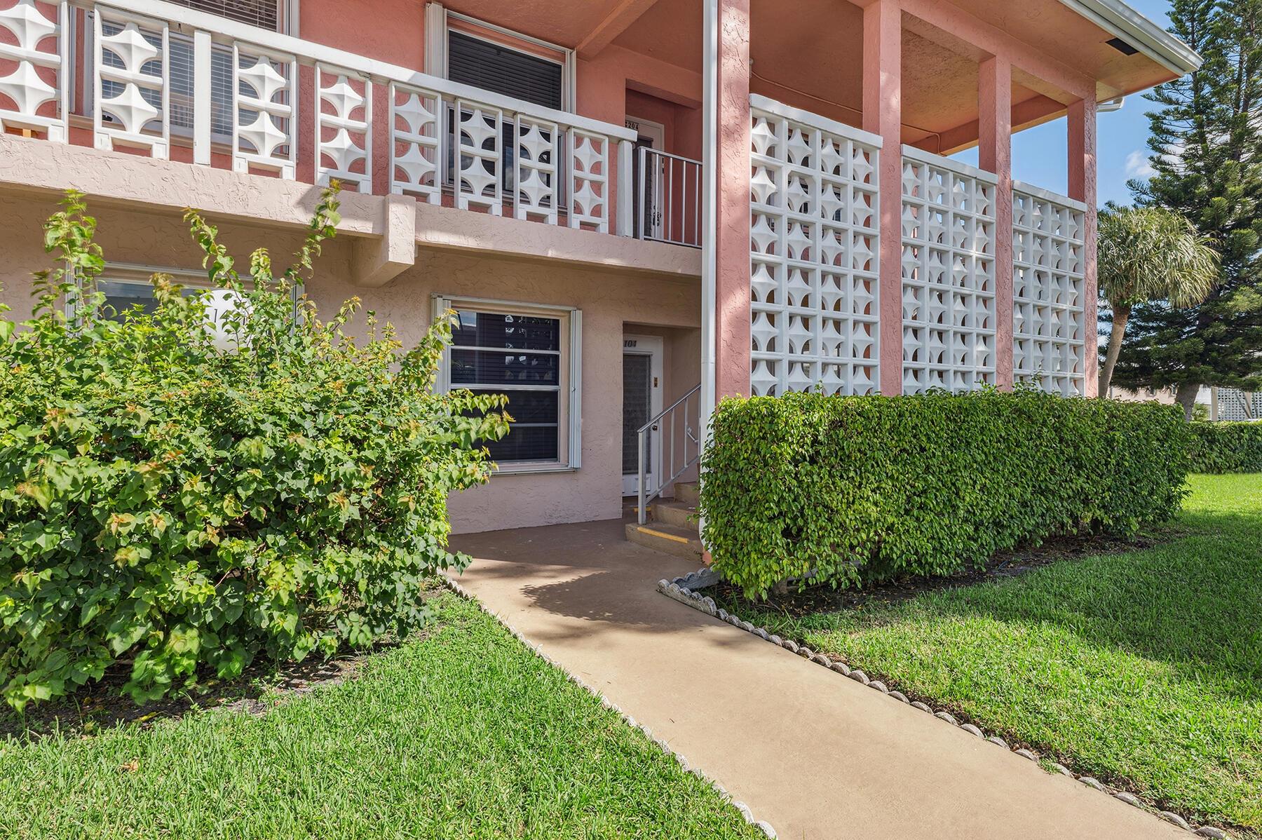 Discover the charm and convenience of this beautifully updated two bedroom/two bath, first floor corner unit in the desirable Pines of Delray North community. Bathed in natural light, this inviting residence boast serene garden views. Thoughtfully designed for modern living, the unit features a split bedroom plan with an open living space. Accessibility is prioritized with wheelchair friendly entry and layout, making it an ideal choice for all lifestyles. Accordian shutters for hurricane protection, ensuring peace of mind during storm season. Ample parking located right near the front entrance. Residents enjoy an array of exceptional community amenities, including two sparkling heated pools, pickeball courts, fitness room and two clubhouses perfect for social gatherings and events.