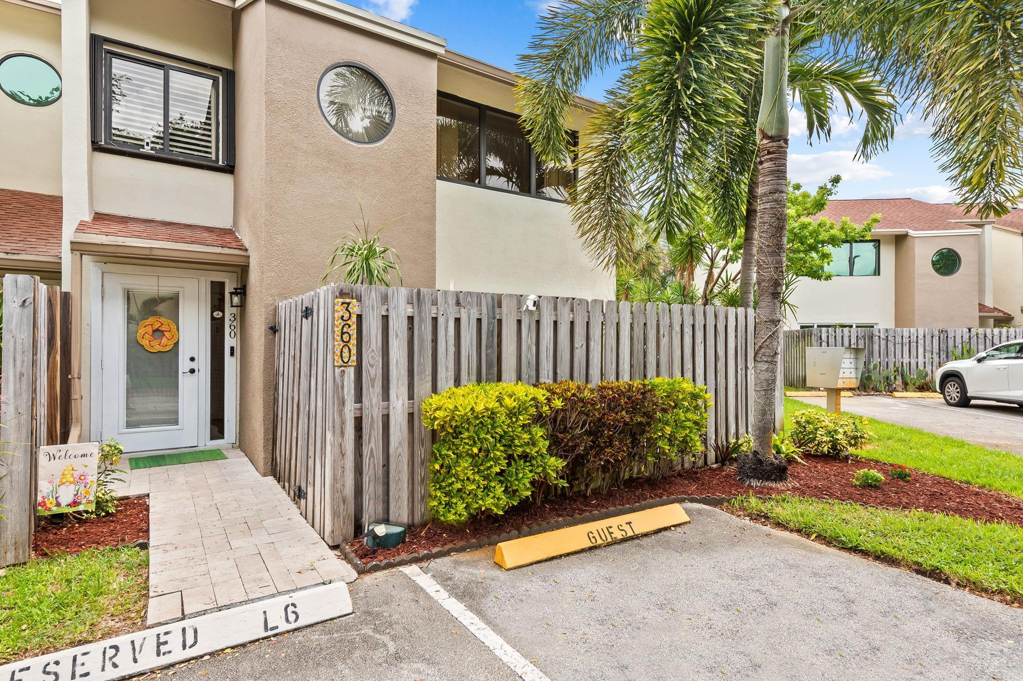FEE SIMPLE 3/2.5 corner unit townhome in the heart of Downtown Fort Lauderdale! Rare floor plan in City View with two upstairs primary bedrooms with en-suites plus a downstairs bedroom and half bath. Remodel completed with permits. Features include FULL IMPACT WINDOWS & DOORS, volume ceilings, updated kitchen with quartz counters & SS appliances, new vinyl flooring, fresh interior paint, laundry room, and private front/back travertine patios. 2010 HVAC, 2013 roof (HOA covered). Gated 18-acre community near Brightline, Flagler Village & Las Olas with heated pool, tennis, and low HOA with reserves. HOA covers exterior insurance, roof, landscaping, fencing, gate, reserves & management. FHA, VA & 3% down loans welcome!