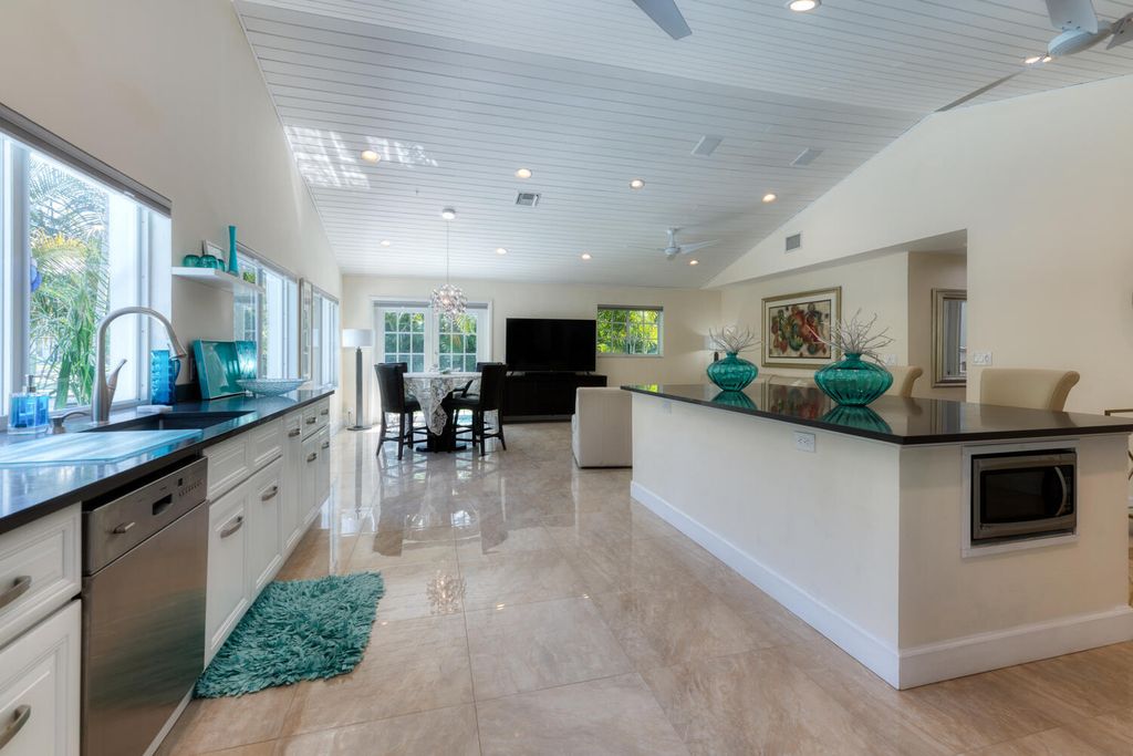 Photo of 1170 Singer Drive, Riviera Beach, FL 33404 (MLS # R10886238)