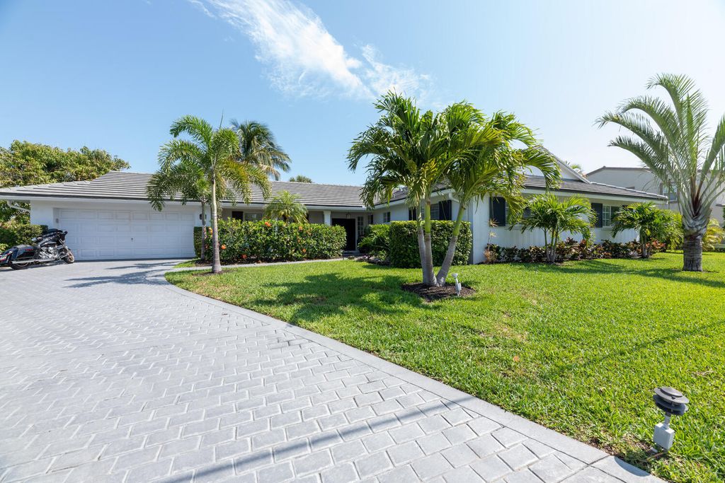 Photo of 1170 Singer Drive, Riviera Beach, FL 33404 (MLS # R10886238)