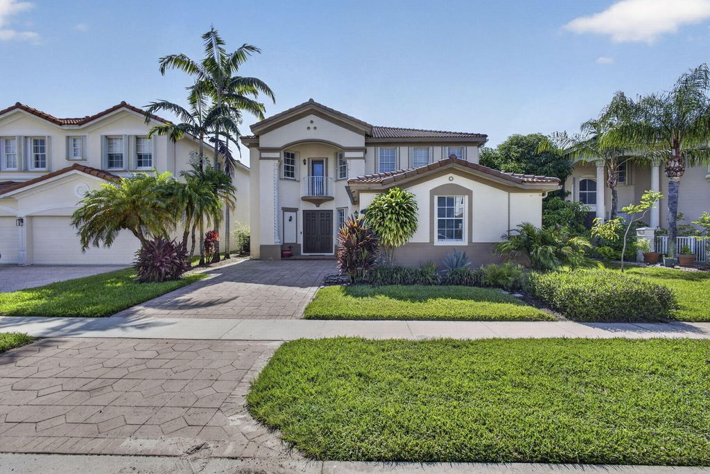 Photo of 10675 Old Hammock Way, Wellington, FL 33414 (MLS # B26047964)