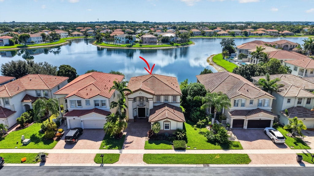 Photo of 10675 Old Hammock Way, Wellington, FL 33414 (MLS # B26047964)