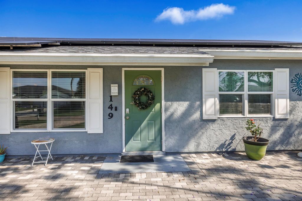 Photo of 149 SW Grimaldo Terrace, Port Saint Lucie, FL 34984 (MLS # R11092916)