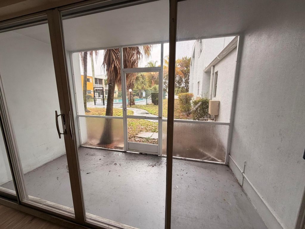 Photo of 1505 Crescent Circle #B21, Lake Park, FL 33403 (MLS # B26002690)