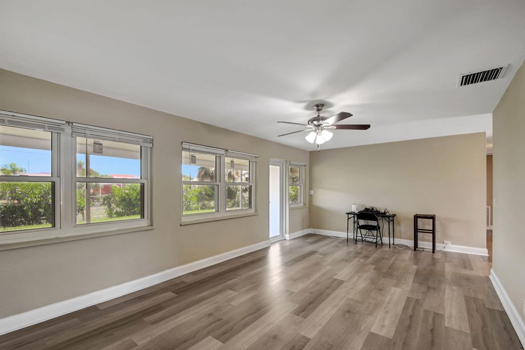 Photo of 831 Evergreen Drive, Lake Park, FL 33403 (MLS # R10999208)