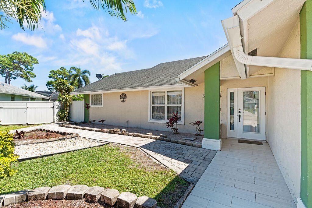 Photo of 4240 Pine Glades Road, West Palm Beach, FL 33406 (MLS # B26017617)