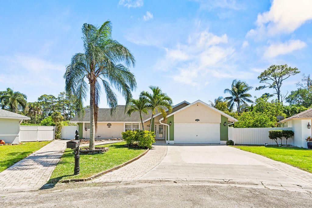 Photo of 4240 Pine Glades Road, West Palm Beach, FL 33406 (MLS # B26017617)
