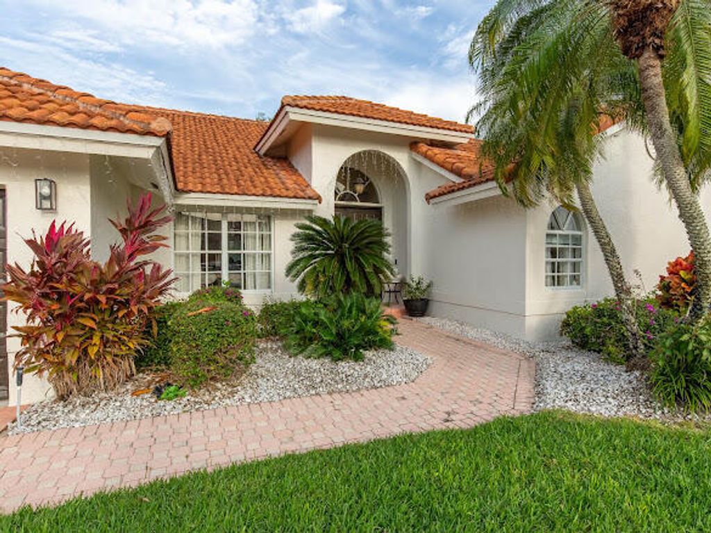 Photo of 6155 Golf Villas Drive, Boynton Beach, FL 33437 (MLS # R11155863)