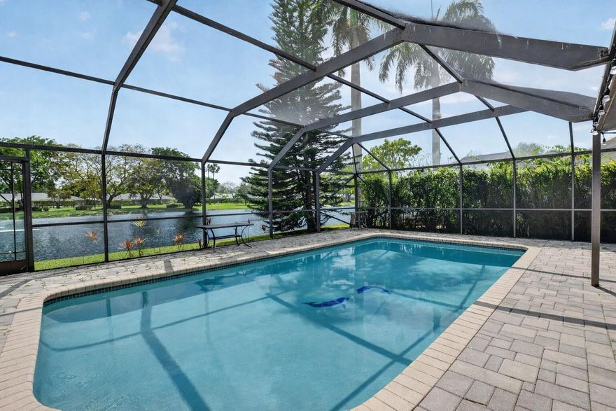Beautifully maintained and fully furnished 2 bedroom, 2 bath residence located in the desirable Villa San Remo community in Boca Raton. This inviting home features a thoughtfully designed layout, including a spacious living area and a finished 2-car garage currently set up as a versatile room.  Step outside to enjoy a private pool overlooking a serene lake view—perfect for relaxing or entertaining. The outdoor space offers a peaceful setting with plenty of room to unwind and enjoy the South Florida lifestyle.  Offered fully furnished for convenience, this property will be move-in ready and ideal for those seeking a comfortable and well-appointed rental. Villa San Remo is a gated community with amenities that may include a clubhouse, pool, tennis courts, and more. Conveniently located.