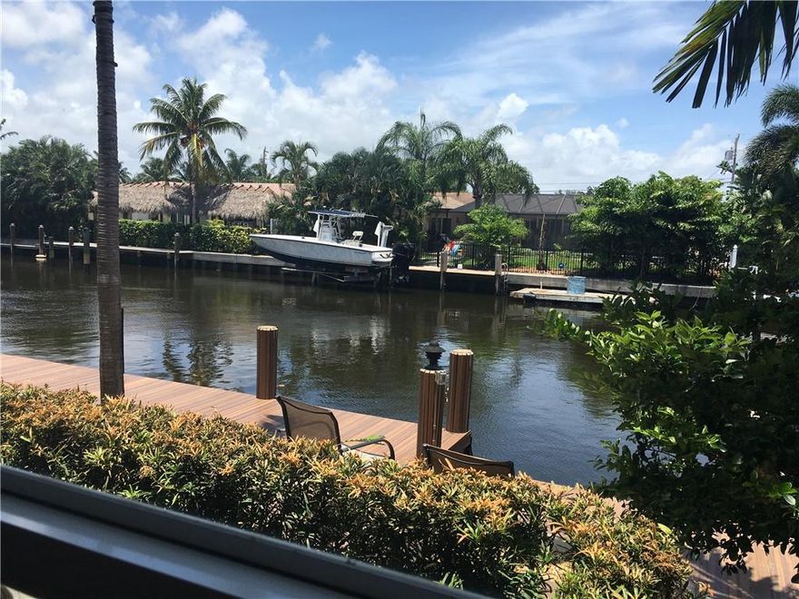 Beautifully completely remodeled condominium with views of the canal. Furnished & located on the water. Two master suites. Stainless steel high-end appliances.  Small 11-unit boutique building. This condominium is located on the first floor of a two-story building. Sliding glass doors to a patio area and view of the canal. Kitchen  Dock space is not available. Annual Lease. Condominium includes furniture but no personal items like dishes, linens & towels.  Assigned parking with guest spaces parking. Located east of US-1. On-site laundry. There is a washer/dryer unit inside the unit but the landlord is not responsible regarding its operation. Dogs up to 30 lbs. are ok with a non-refundable $500 security deposit. Minimum credit score of 680 required by Association.