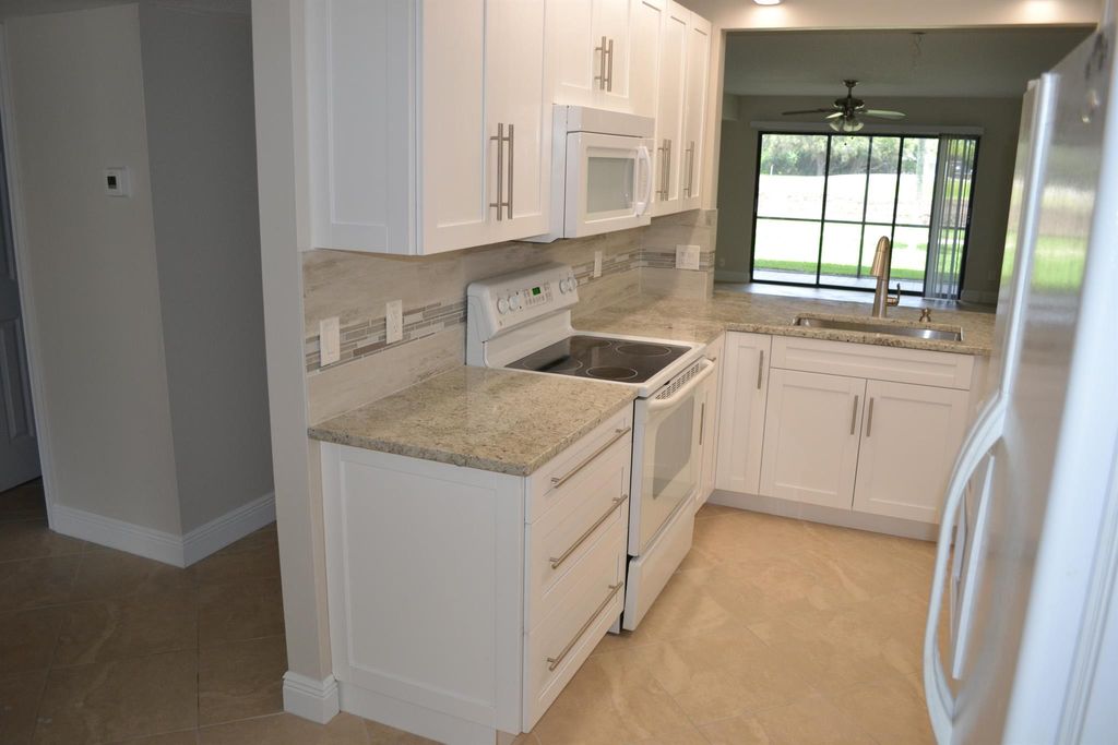 Photo of 1071 Keystone Drive #C, Jupiter, FL 33458 (MLS # R11028209)