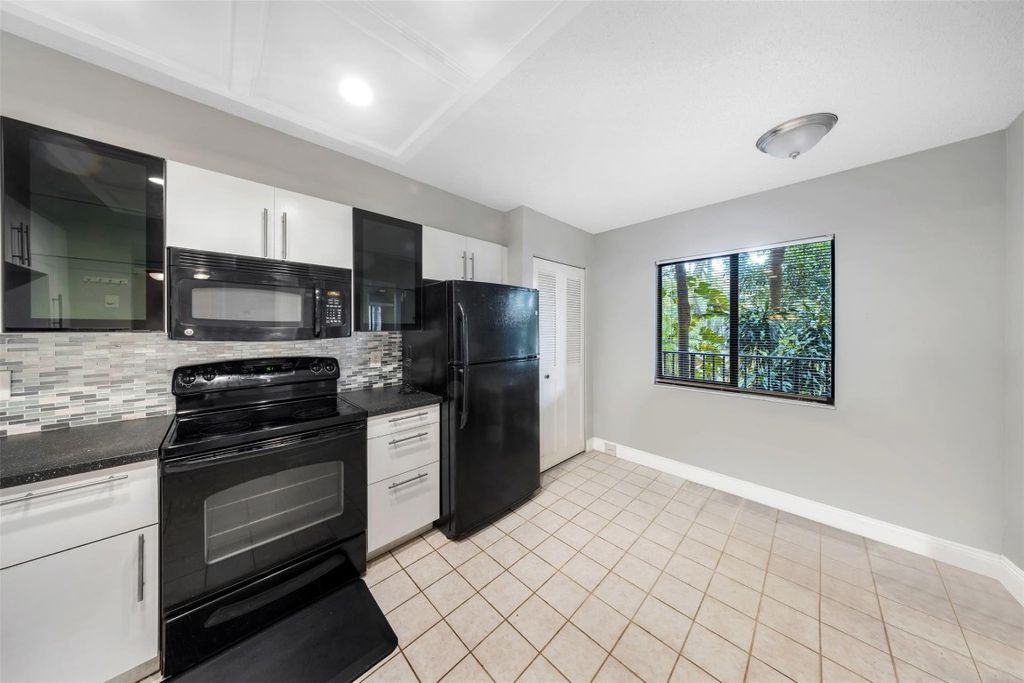 Photo of 2202 S Cypress Bend Drive #207, Pompano Beach, FL 33069 (MLS # F10526991)